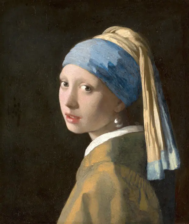 Vermeer's Girl with a Pearl Earring: a girl in a blue and gold headscarf turning to look over her shoulder, with a large pearl earring at her jaw.